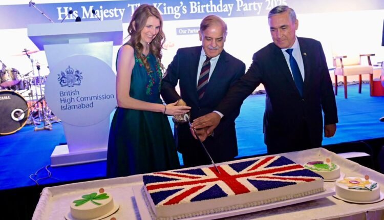 Prime Minister Muhammad Shehbaz Sharif cuts cake on the eve of birthday of His Majesty Charles III, the King of Britian